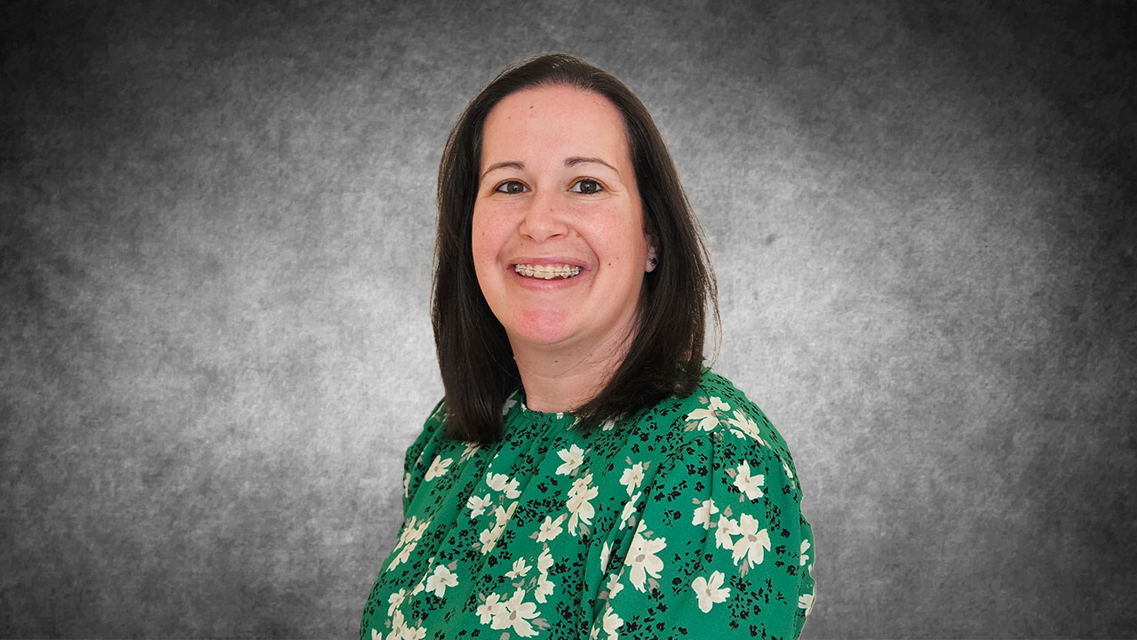 Professional headshot of Kelly Balodis.